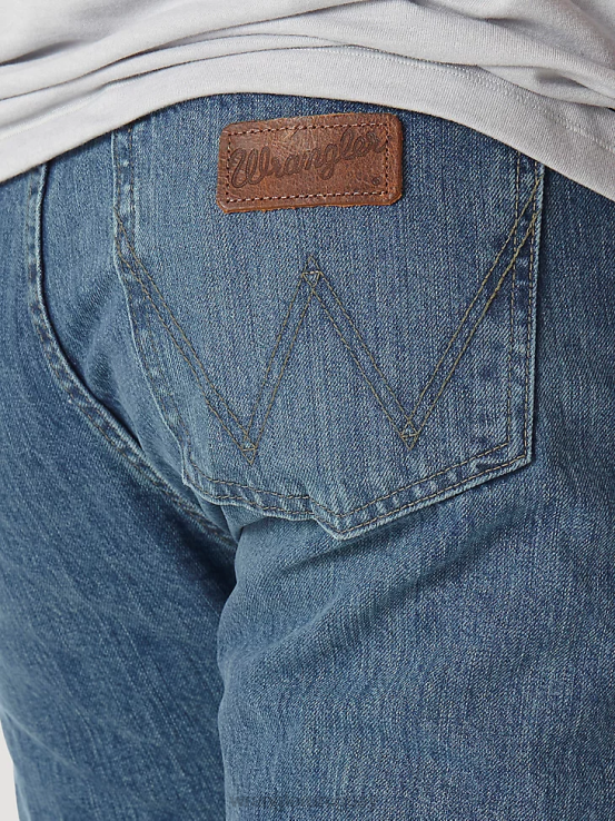 gastado Wrangler hombres jeans retro con corte tipo bota y corte slim ropa F8J4V9